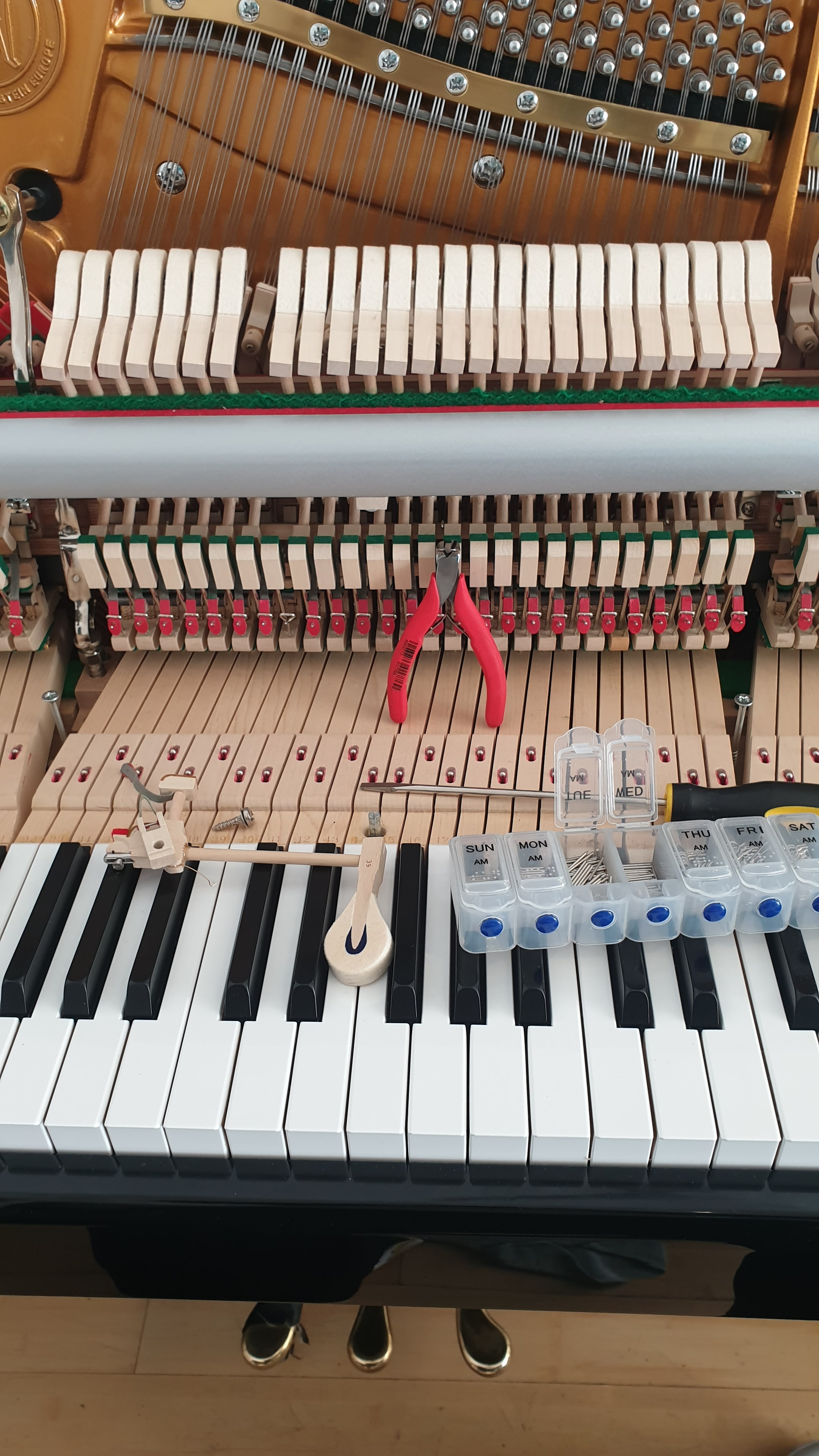 Piano technician at work